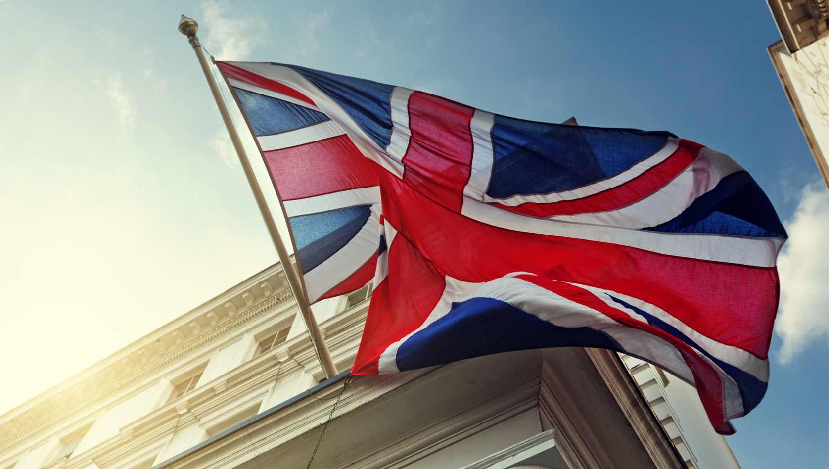 Image shows the Union Jack flag flying from a building. Image depicts British-made products