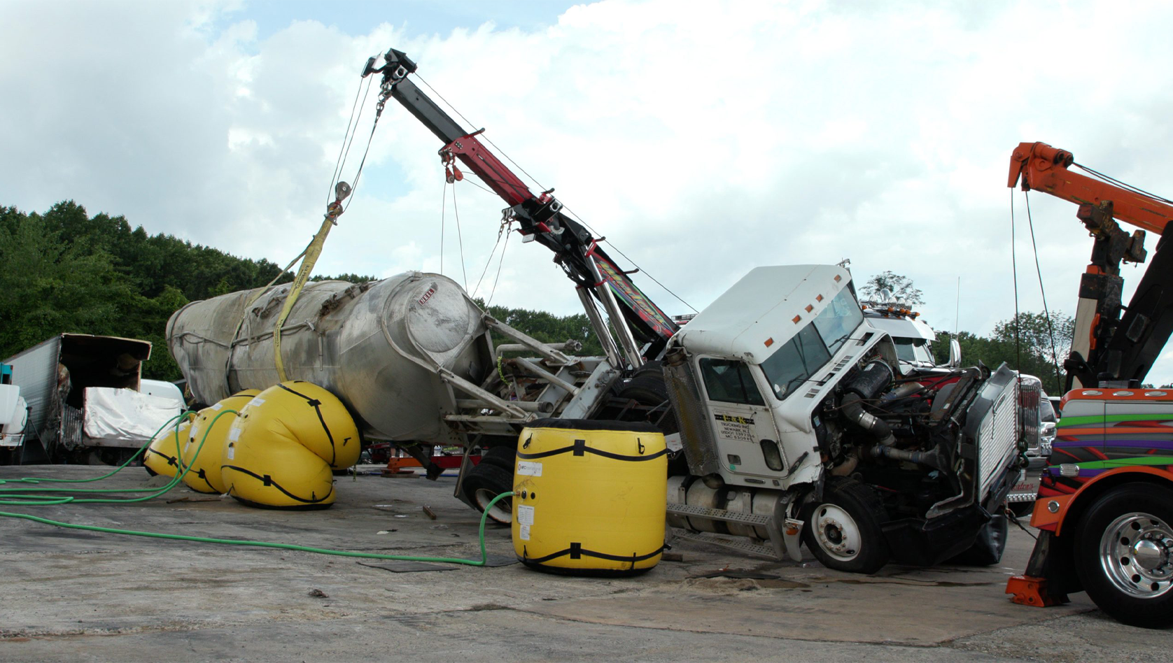 Image shows a vehicle being recovered. Image depicts the excellent products that T&C Services provide to recover, lift and tow any vehicle safely