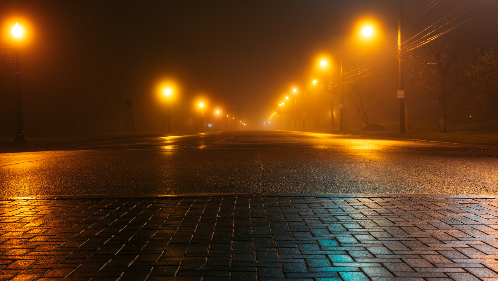 Image shows a winter road in the dark. Image depicts the importance of reliable winter lighting for vehicle recovery